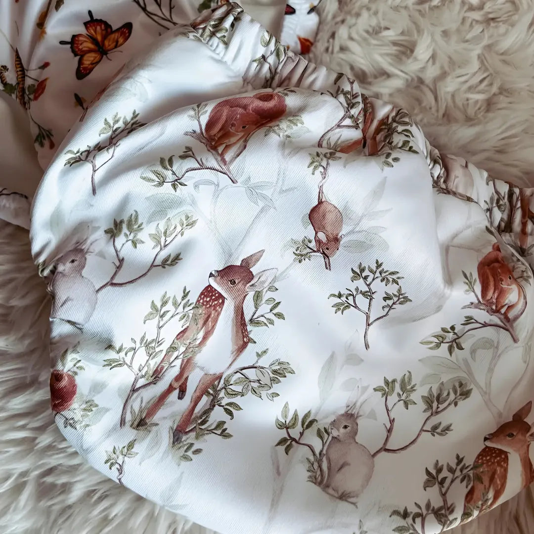 Vue du dessus d'une culotte d'apprentissage à motif animaux de la forêt Presque Grand